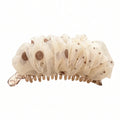 Bronze glitter polka dot mesh banana hair clip on a white background