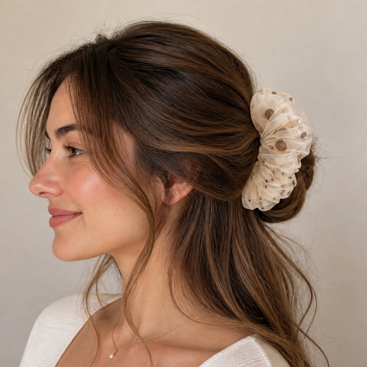 Bronze glitter polka dot mesh banana hair clip worn in hair