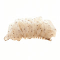 Brown polka-dot mesh banana hair clip, white background