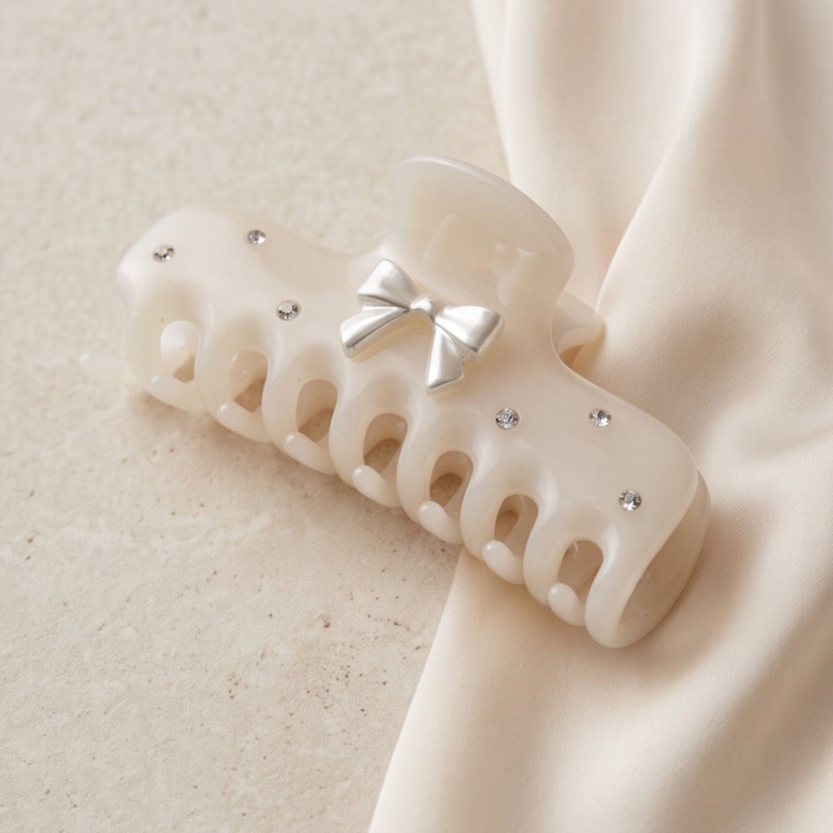 Ivory Metal Bow Black Rhinestone Acetate Claw Clip